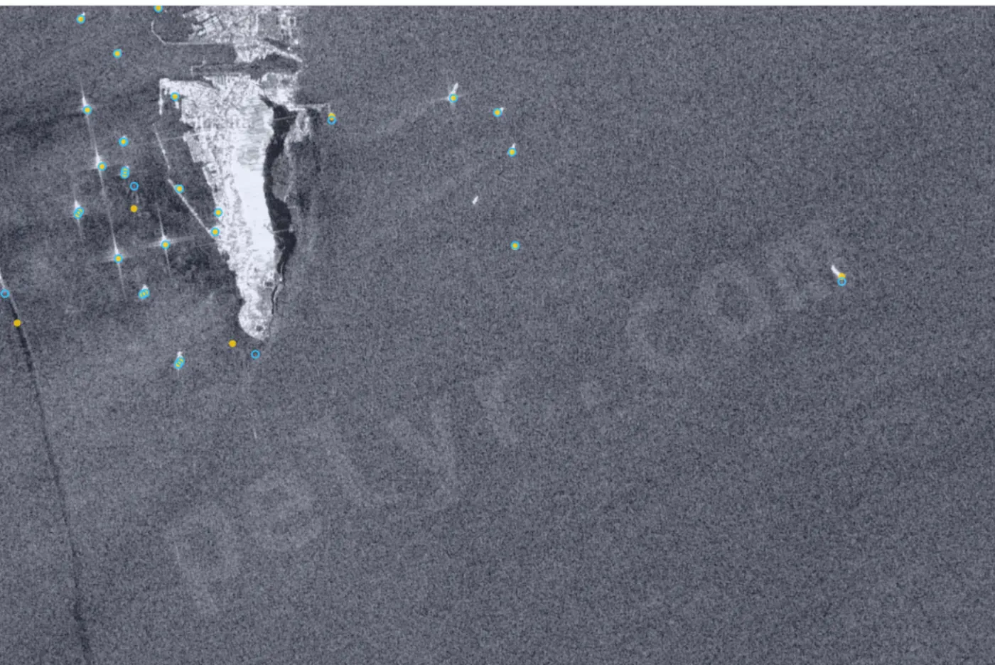 Satellite radar scene of a coastline with recorded AIS vessel positions.