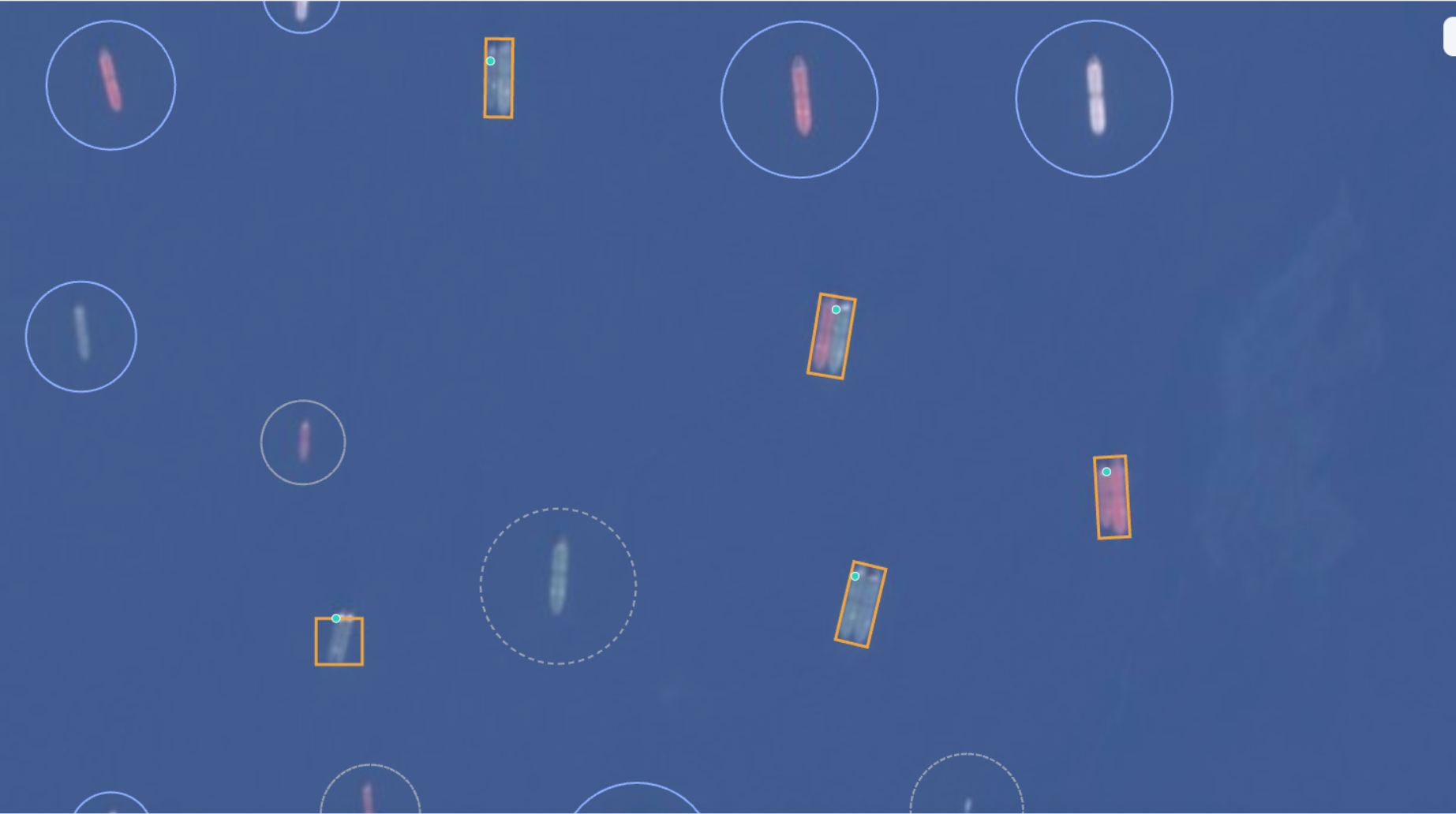 Satellite image with marked vessel detections and AIS markers.